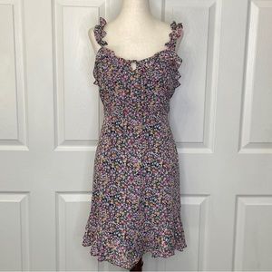 Lulu’s Parisian Girl Black Floral Print Ruffled Mini
Dress